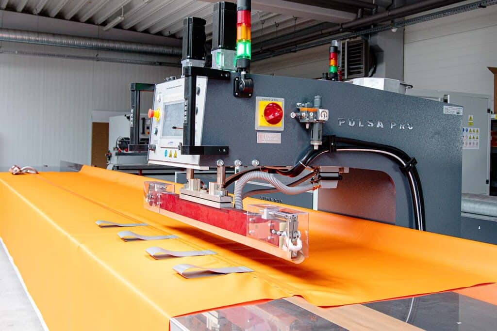 How are billboards and banners for advertising industry produced